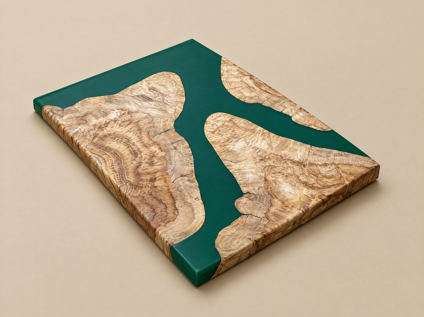 Rectangular serving tray of burl wood pieces set in dark green epoxy