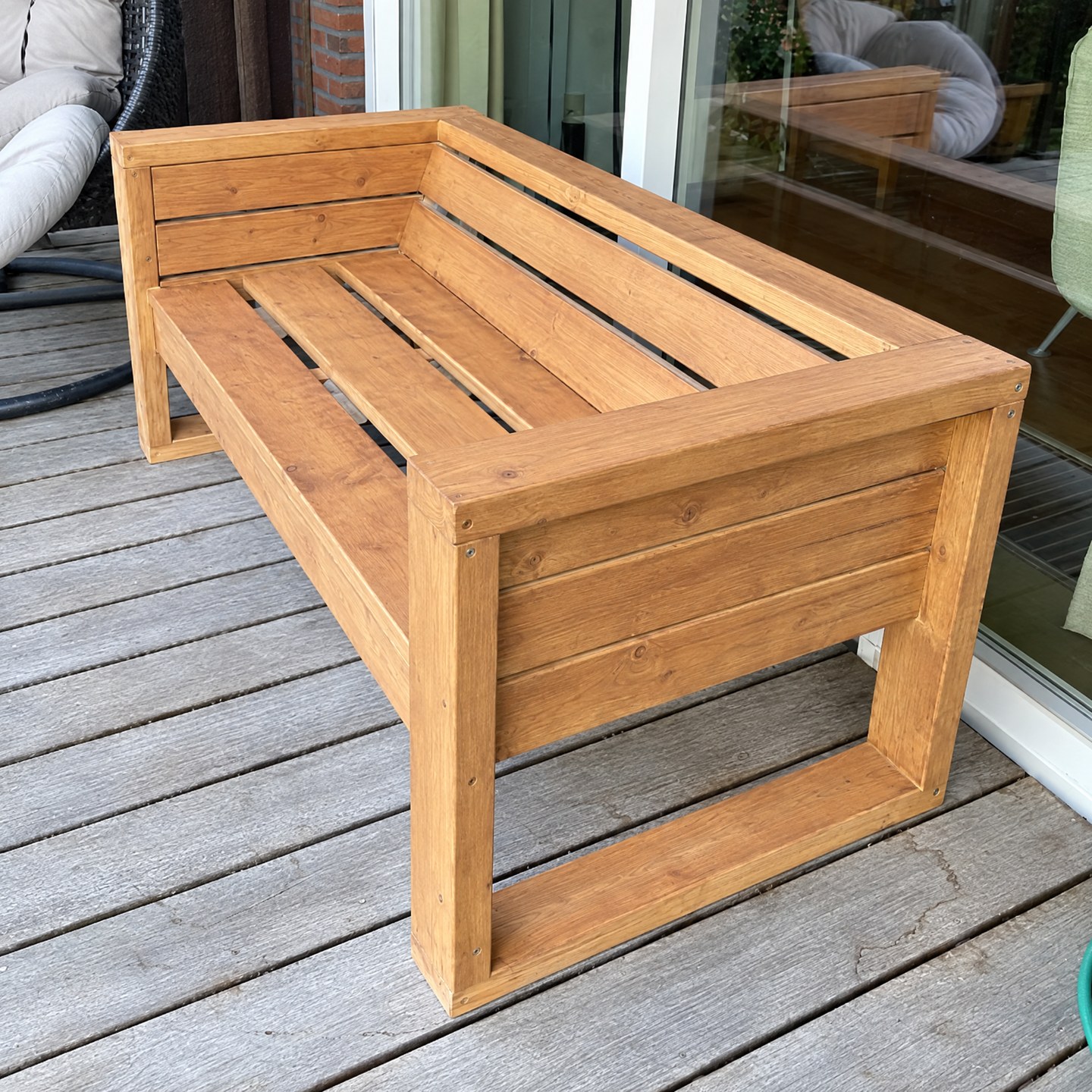 The finished, stained bench on the terrace