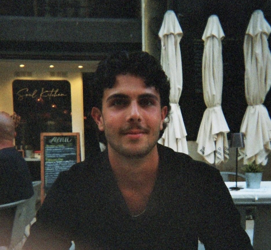 Tim Morera on a restaurant terrace